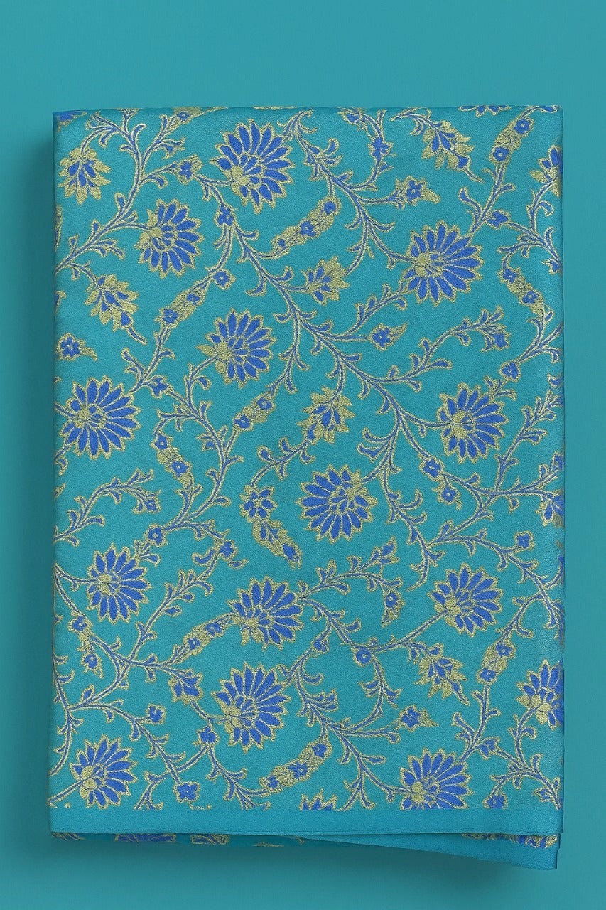 BLUE AND GOLD ON LIGHT SEA GREEN